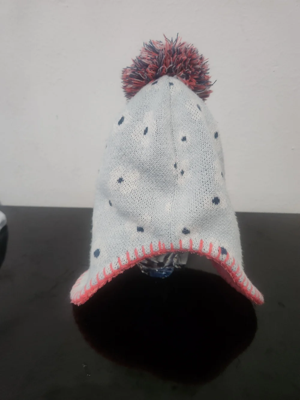 The North Face Kids Earflap Pom Beanie in Light Gray and Pink